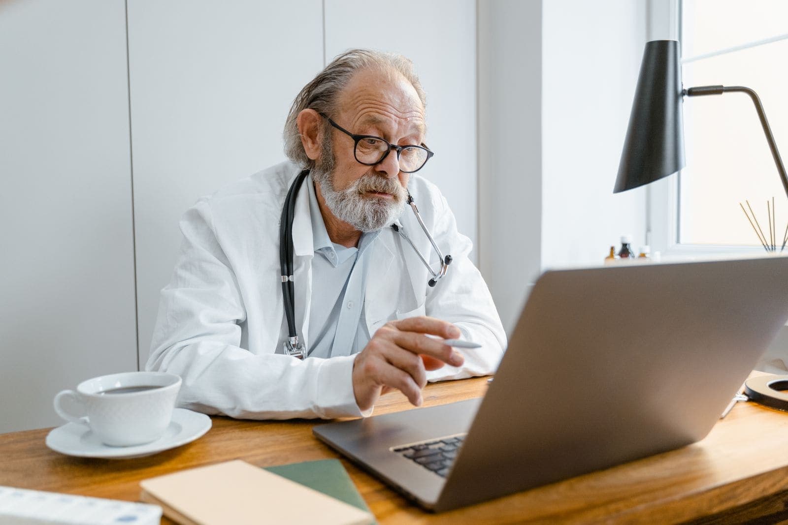 A woman having a telehealth appointment from home