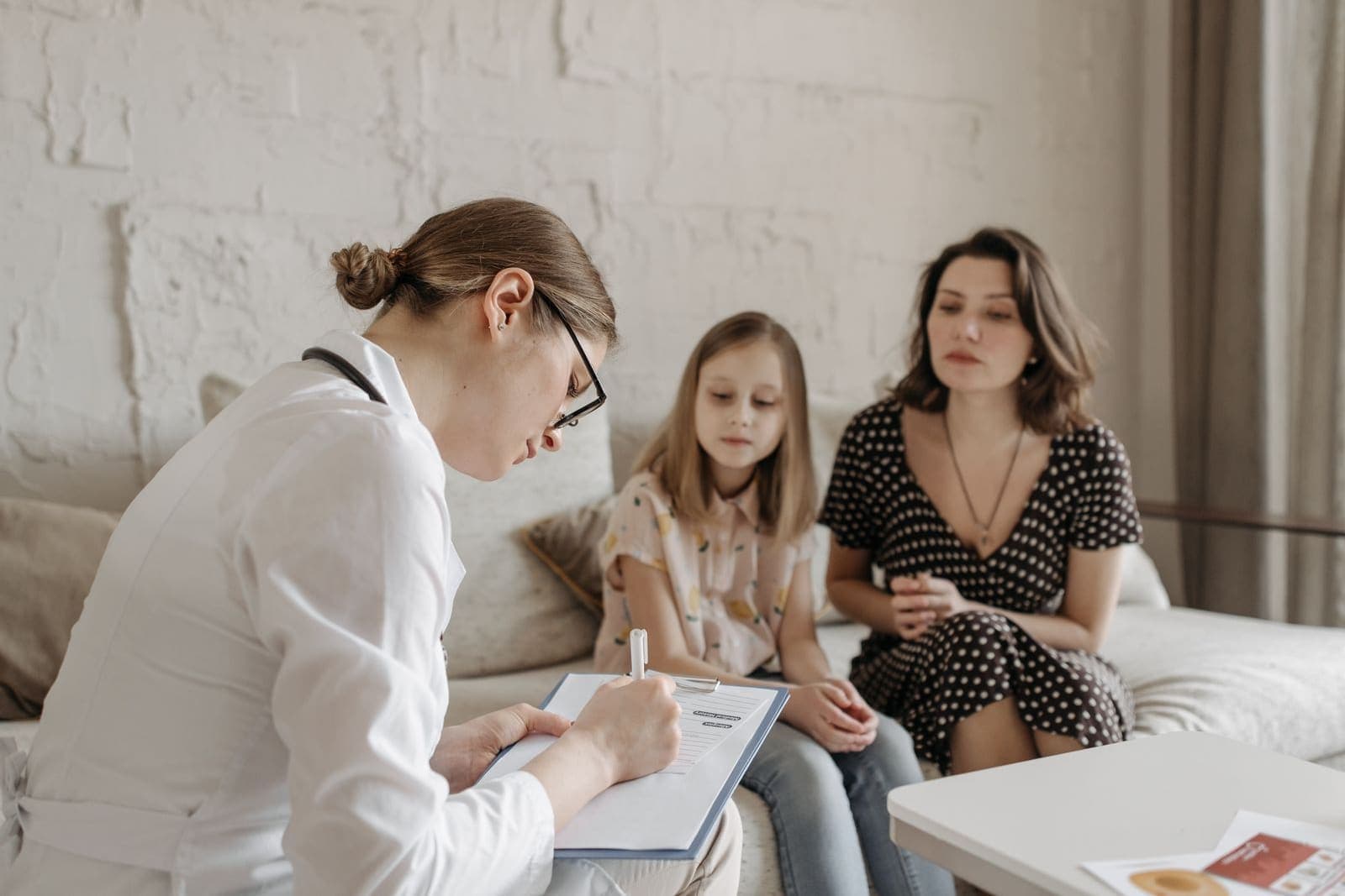 A family doctor talking with a patient